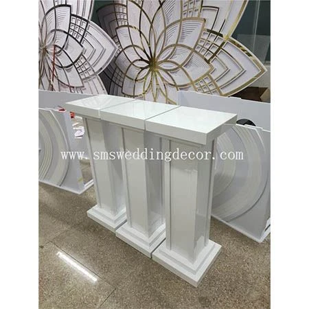 white pedestal stands